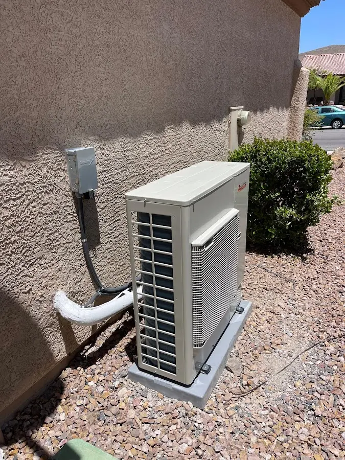 Residential air conditioning condenser unit in Silvis